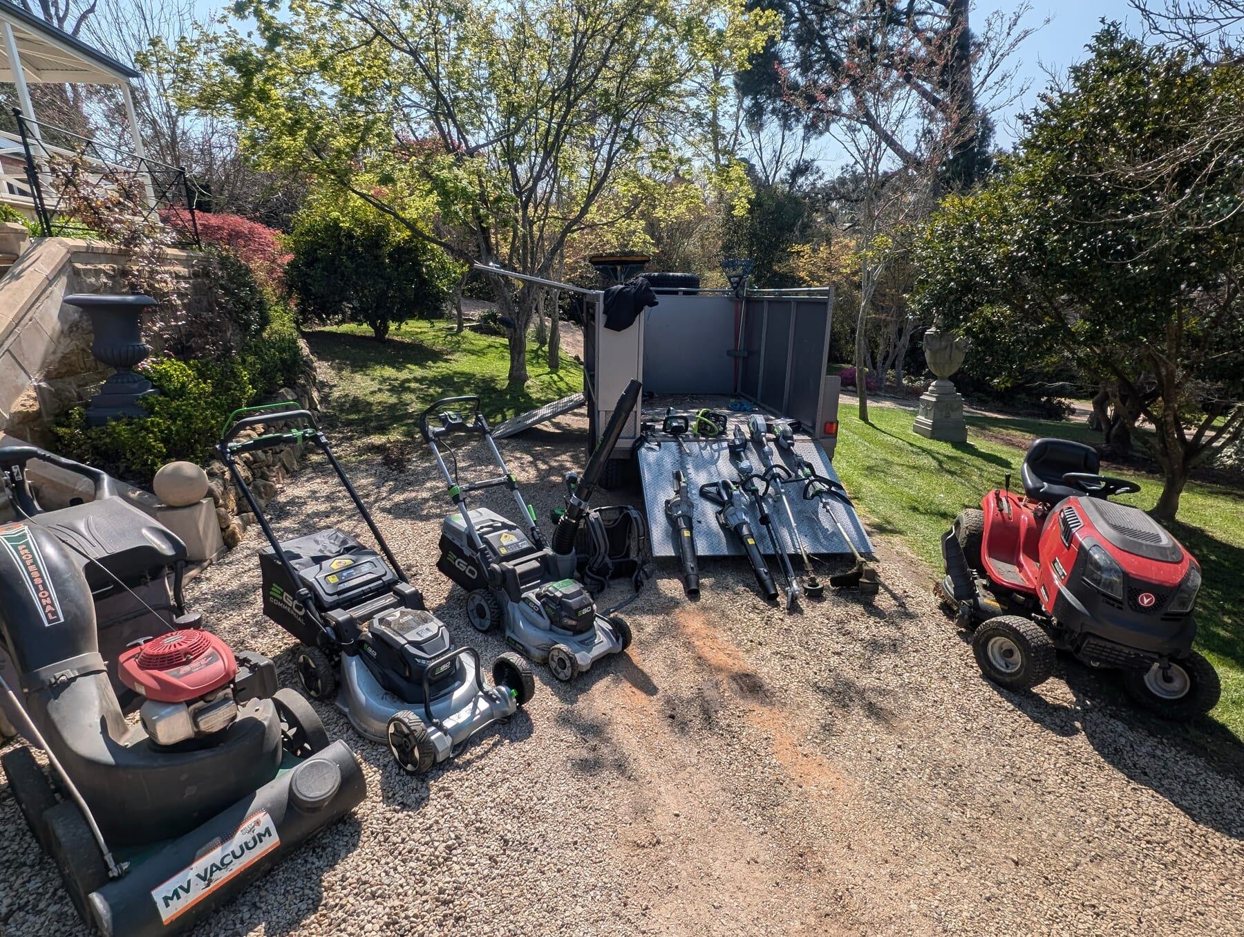 The Green & Clean kit for a typical run: commercial mowers, leaf vacuums, blowers and edger pack